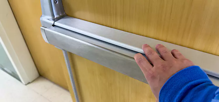 Installing a Push Bar on a Door Pine Hills